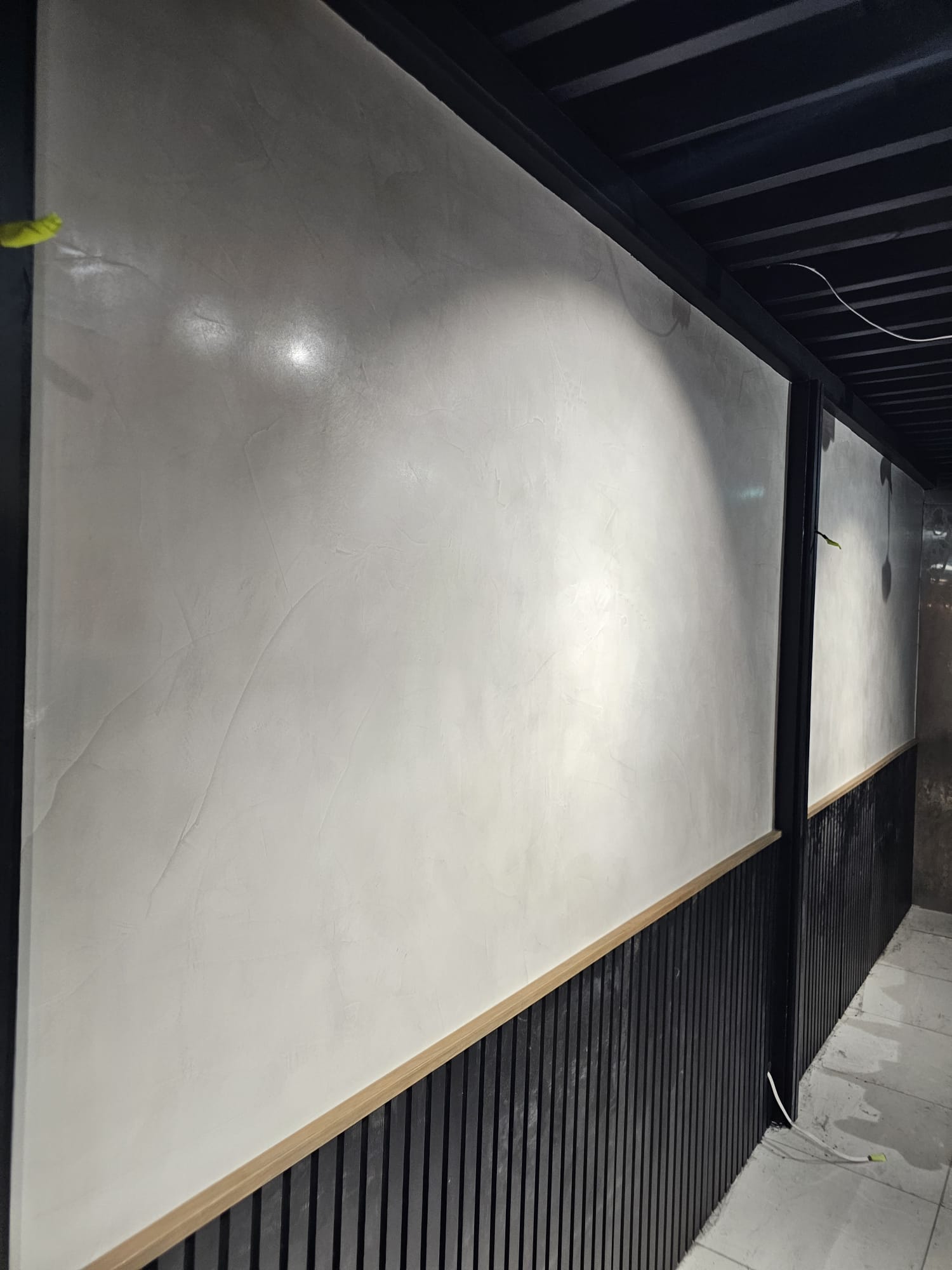 Elegant Venetian plaster feature wall finish in a Sydney interior