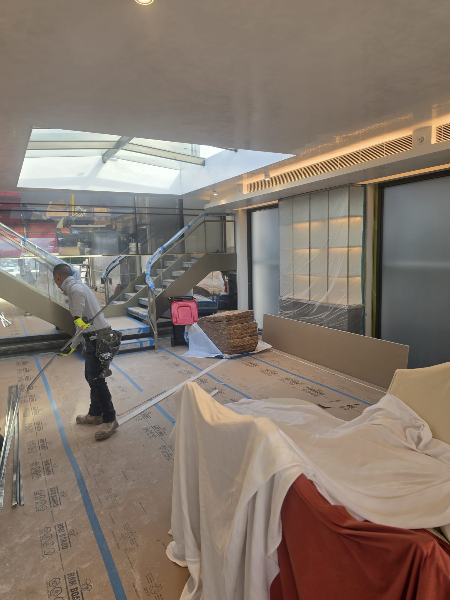 Maestro Painting tradesperson working carefully on a high-end Sydney interior fit-out