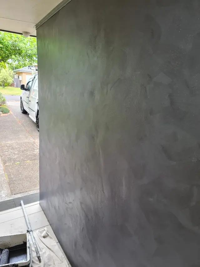 Feature wall with a smooth decorative finish installed by Maestro Painting in a Sydney fit-out